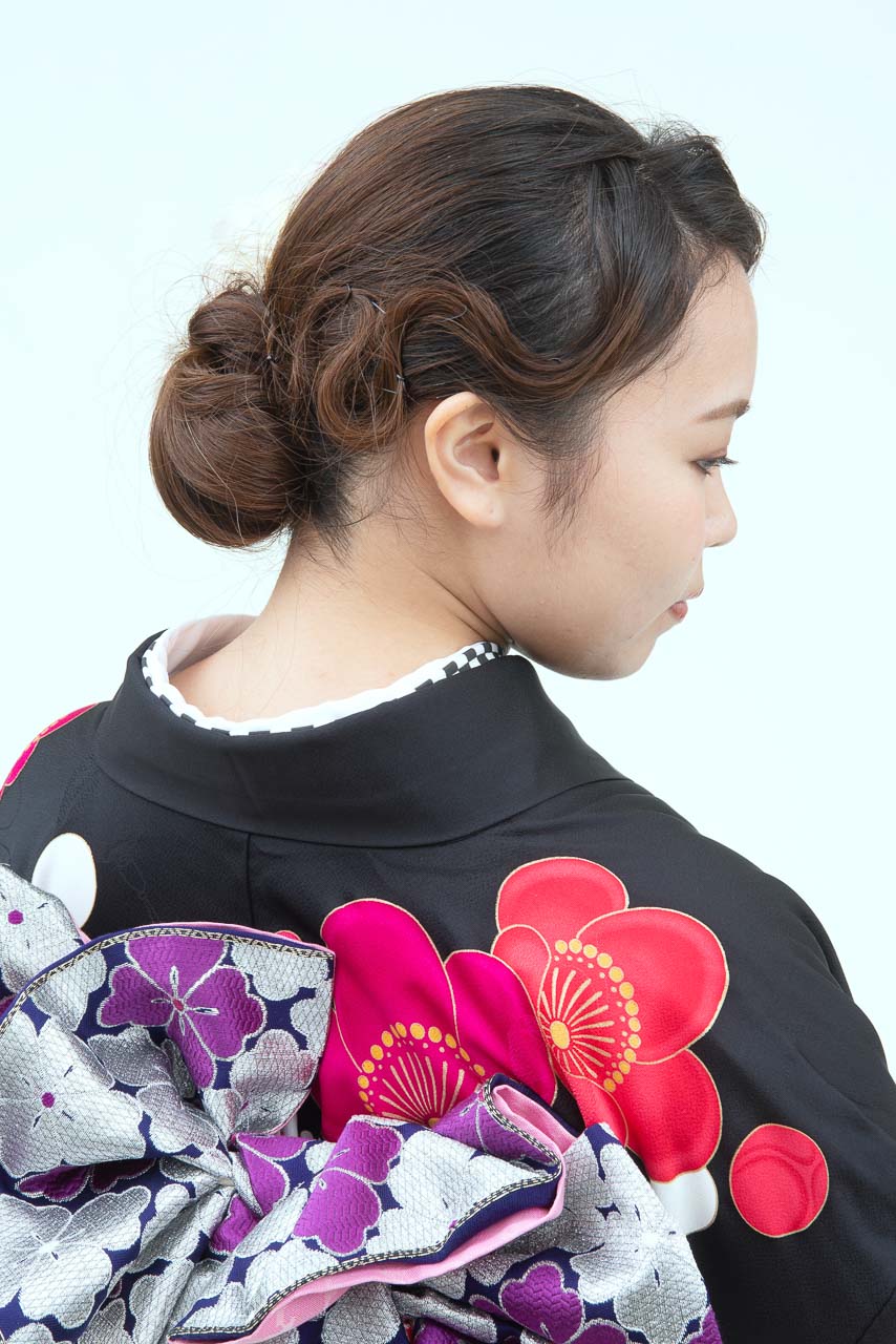 黒地に梅花爛漫